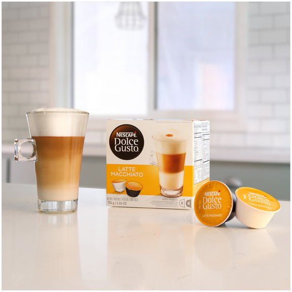Caja de cápsulas de café Dolce Gusto® al por mayor acompañadas por una taza de café latte