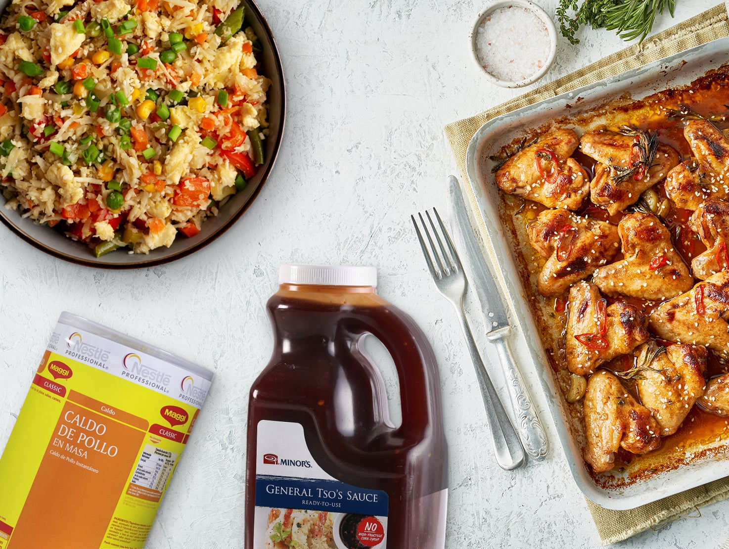 Una receta de arroz y otra de alitas de pollo realizadas con productos culinarios MAGGI® Y MINOR'S®.