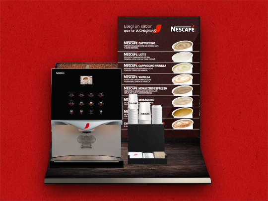 Máquina de café en grano NESCAFÉ® en un módulo con vasos, endulzantes, material POP y opciones de bebidas