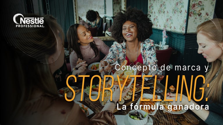 Grupo de personas compartiendo comida en un restaurante, ilustrando conexión y concepto de marca.