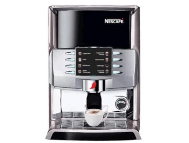 Una de las máquinas automáticas de café soluble que tiene NESCAFÉ®